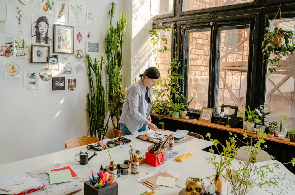 An artist designs in her studio