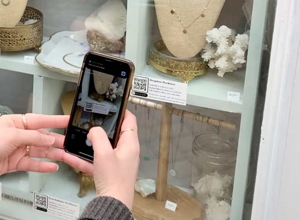 A Foamy Wader customers shops right from the store window display by scanning a QR code on their mobile device